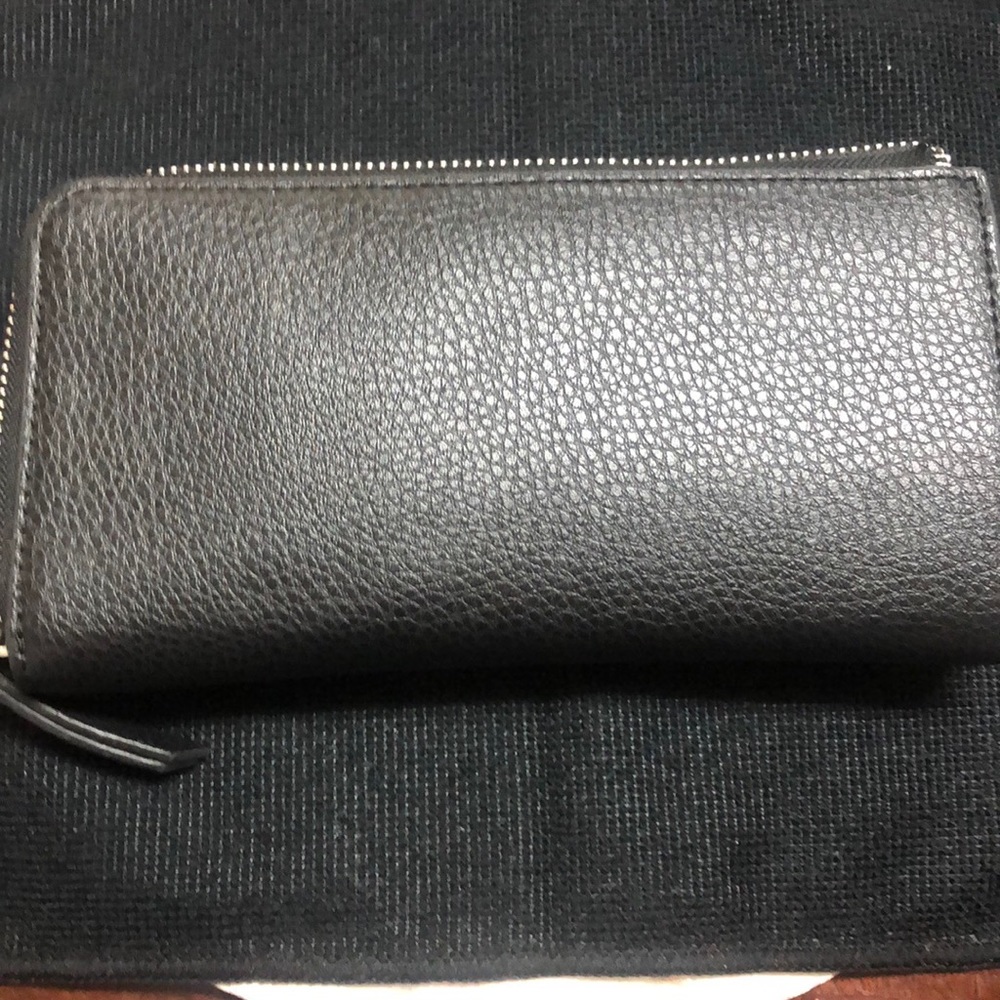 New York &Company black leather wallet with 3 Compartment use in good Condition